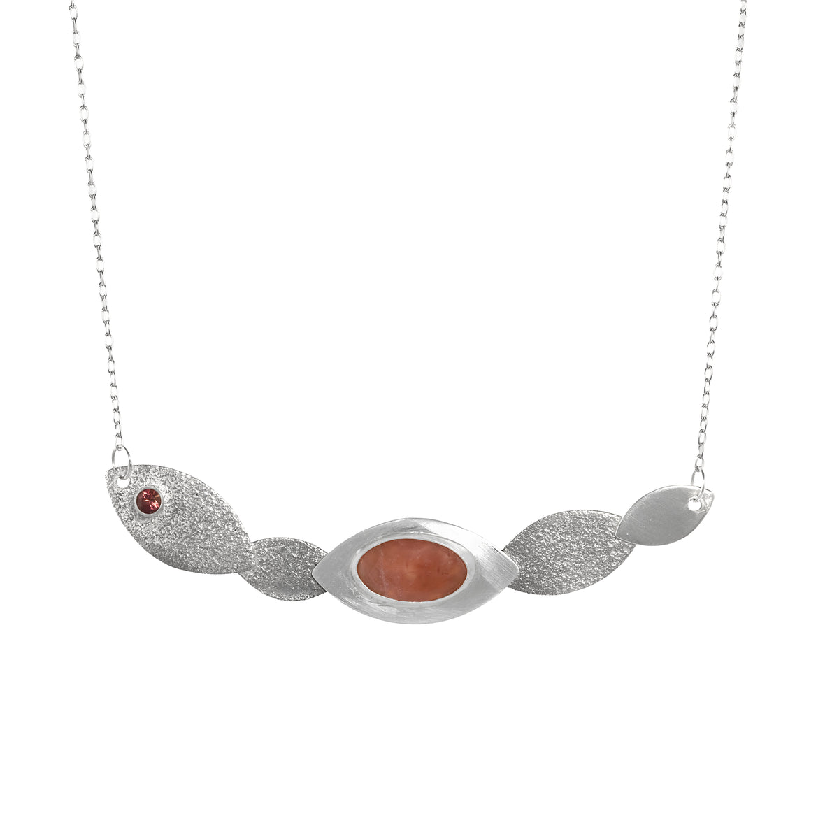 One-of-a-kind pendant necklace, hand fabricated from sterling silver, and featuring a 15x9mm rhodochrosite cabochon from Argentina and a 4mm pink tourmaline. 
