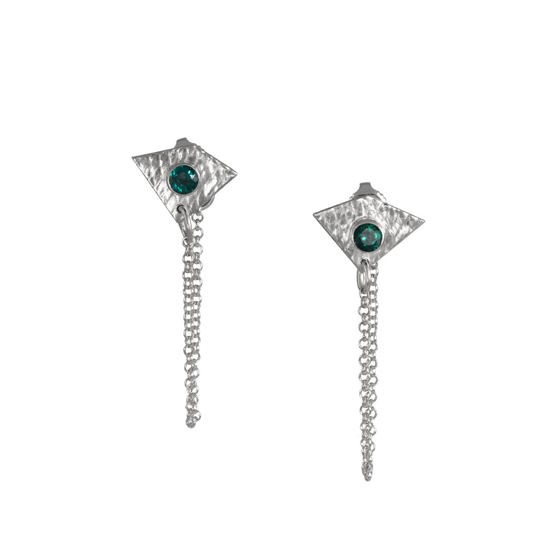 Handcrafted, sterling silver post earrings featuring teal topaz gemstones and dangling silver chains.