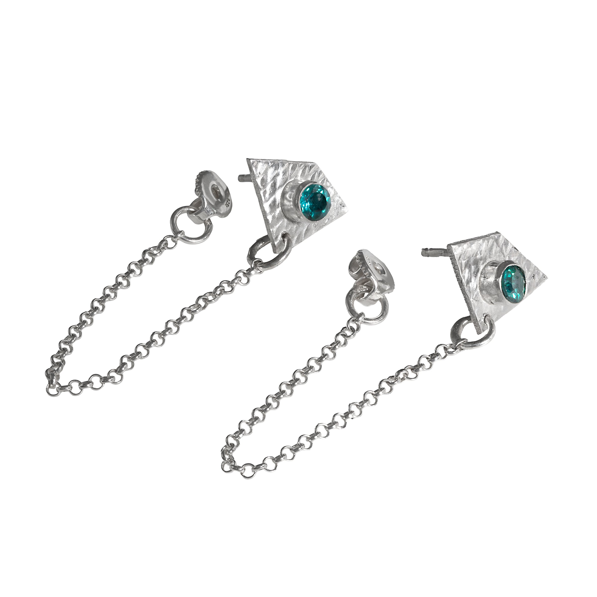 Handcrafted, sterling silver post earrings featuring teal topaz gemstones and dangling silver chains.