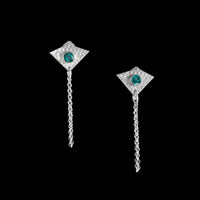 Handcrafted, sterling silver post earrings featuring teal topaz gemstones and dangling silver chains.
