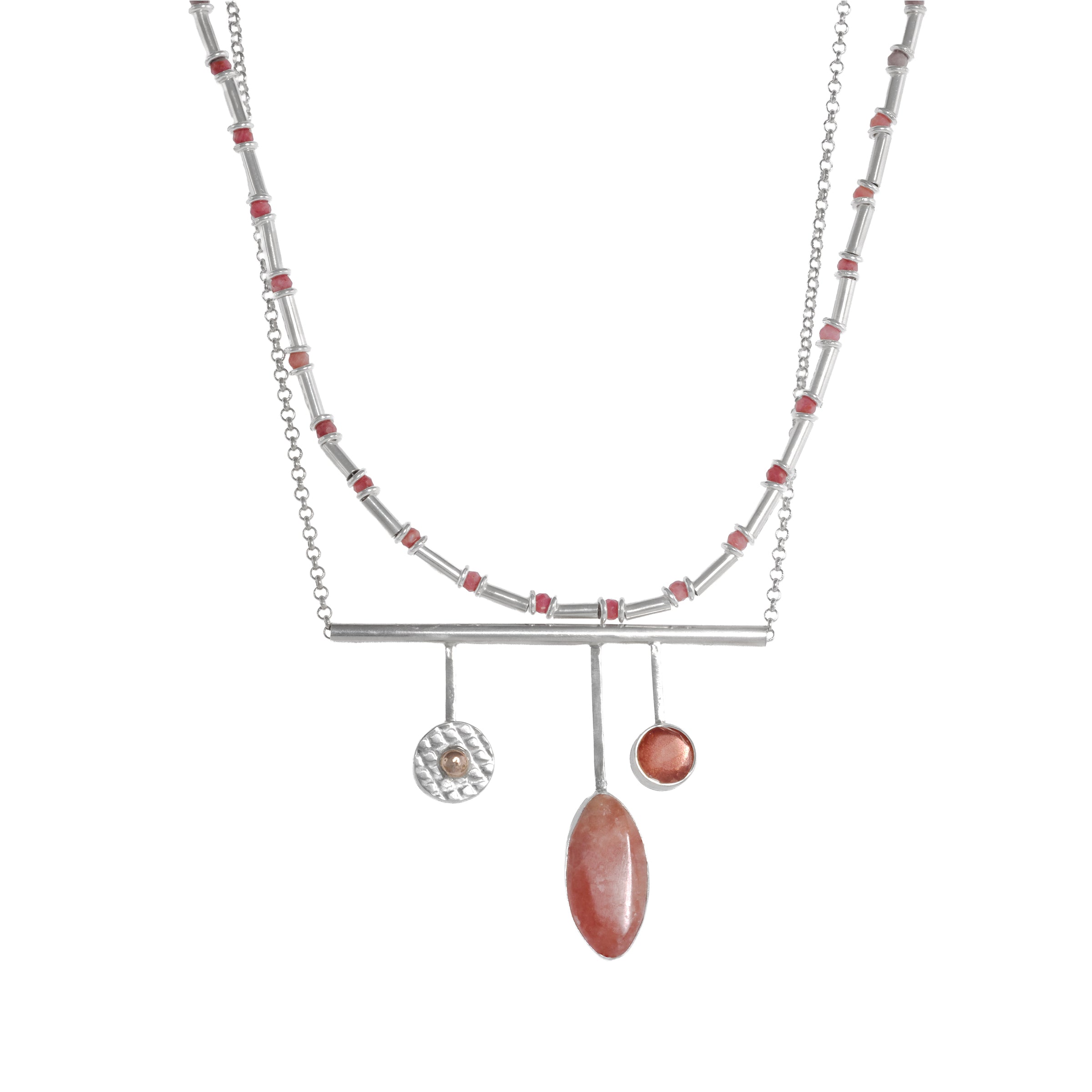 Handcrafted, contemporary pendant necklace in sterling silver and featuring a rhodochrosite cabochon, Oregon sunstone and 14K gold ball. 