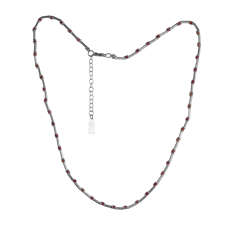 Handcrafted necklace with rhodochosite beads interspersed with sterling silver tubes.