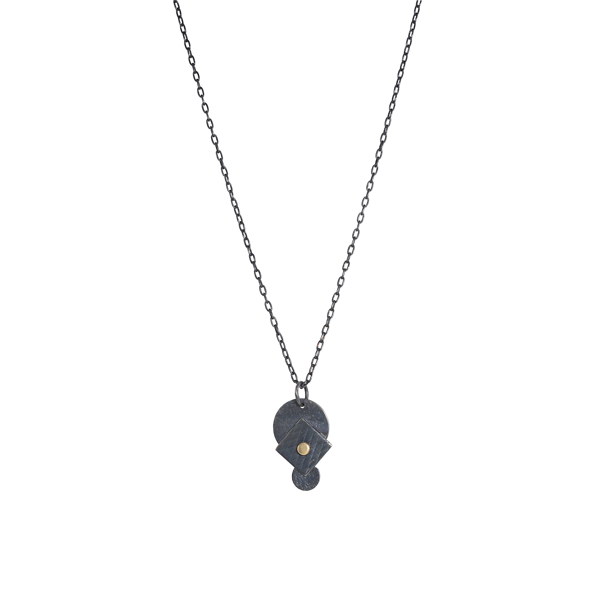 Oxidized argentium sterling silver and 18K gold charm pendant necklace with contemporary geometric styling in a layered look.