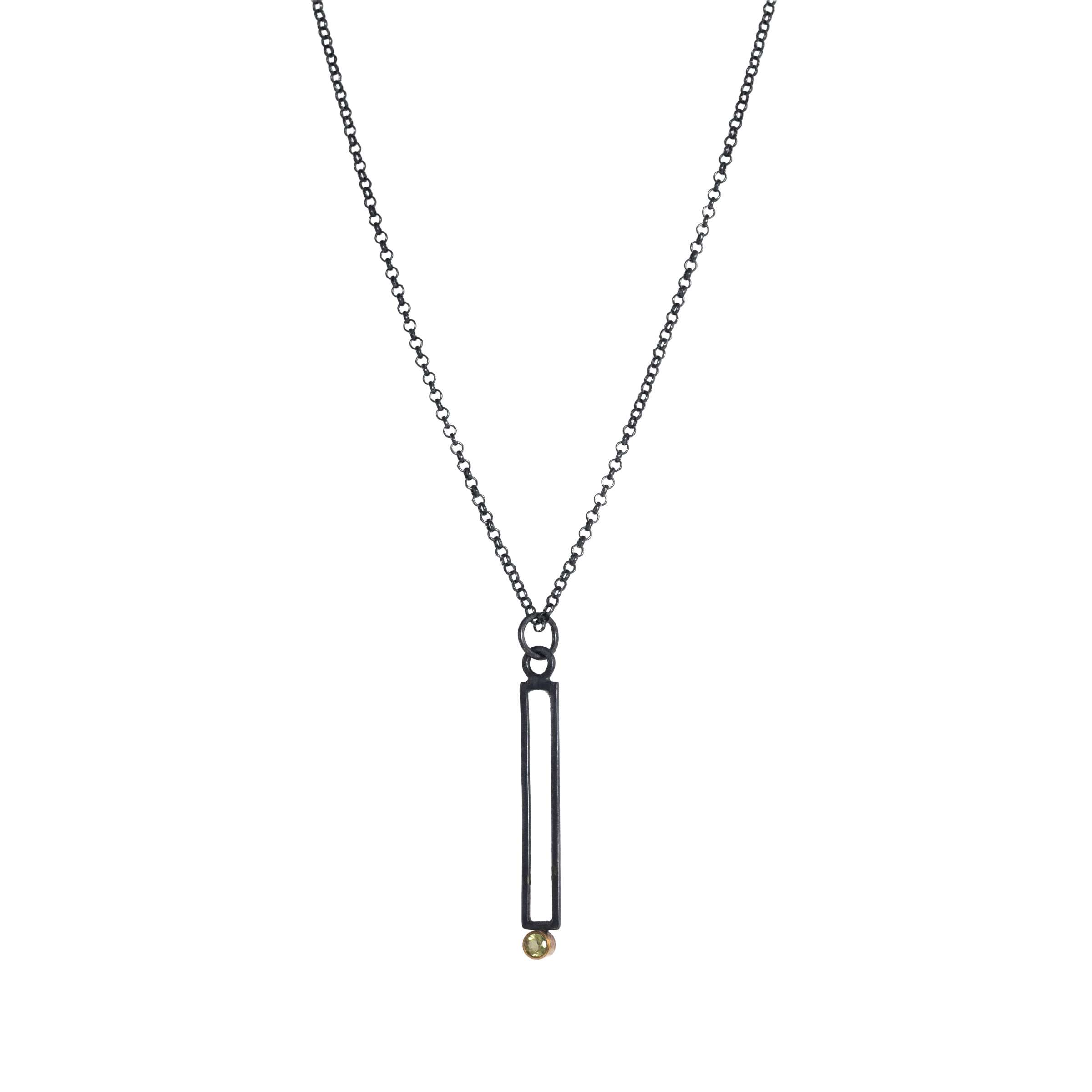 Geometric design pendants, handcrafted with Argentium sterling silver and green peridots set in 18K gold bezels.  Sterling silver chain.