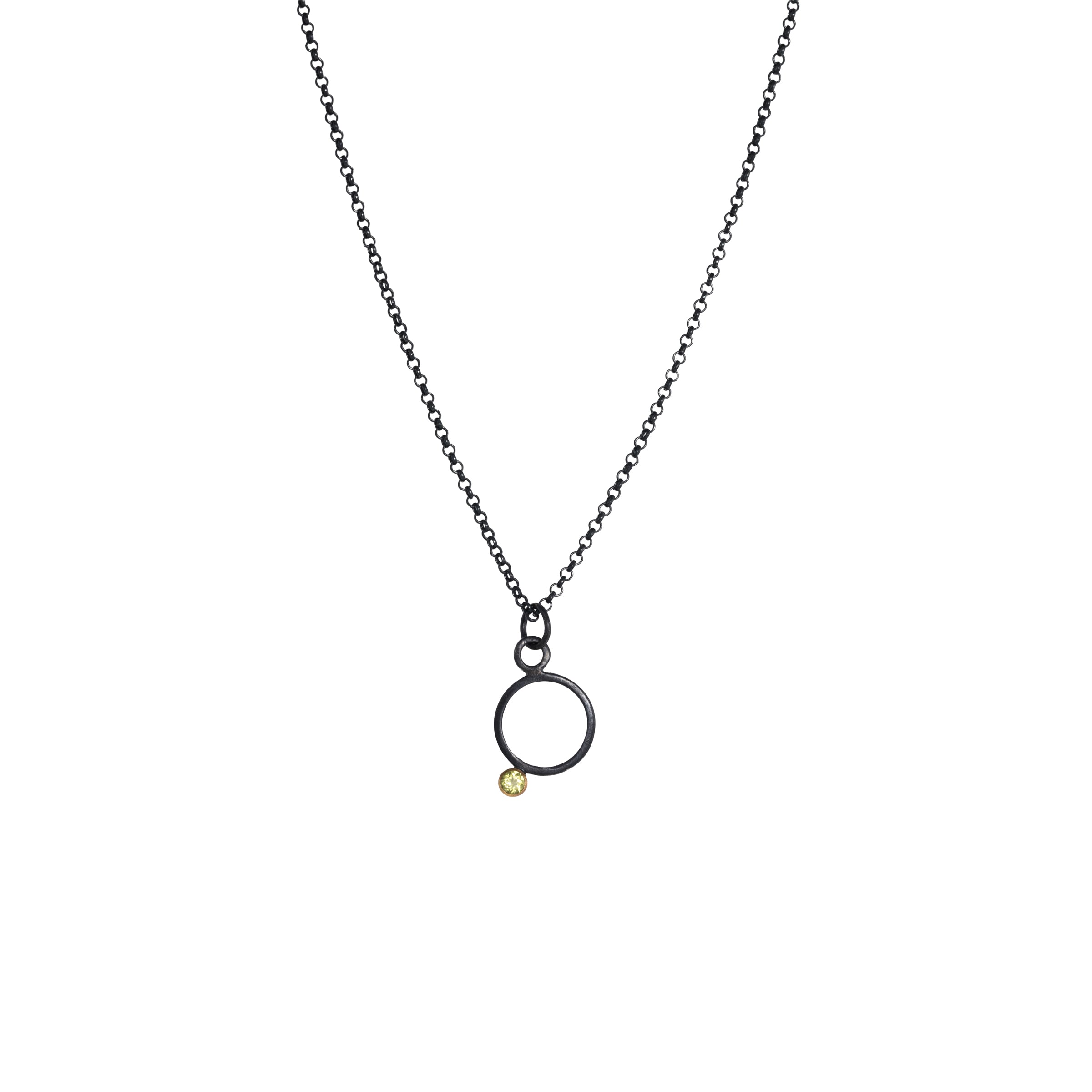 Geometric design pendants, handcrafted with Argentium sterling silver and green peridots set in 18K gold bezels.  Sterling silver chain.