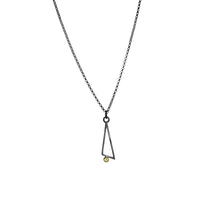Geometric design pendants, handcrafted with Argentium sterling silver and green peridots set in 18K gold bezels.  Sterling silver chain.