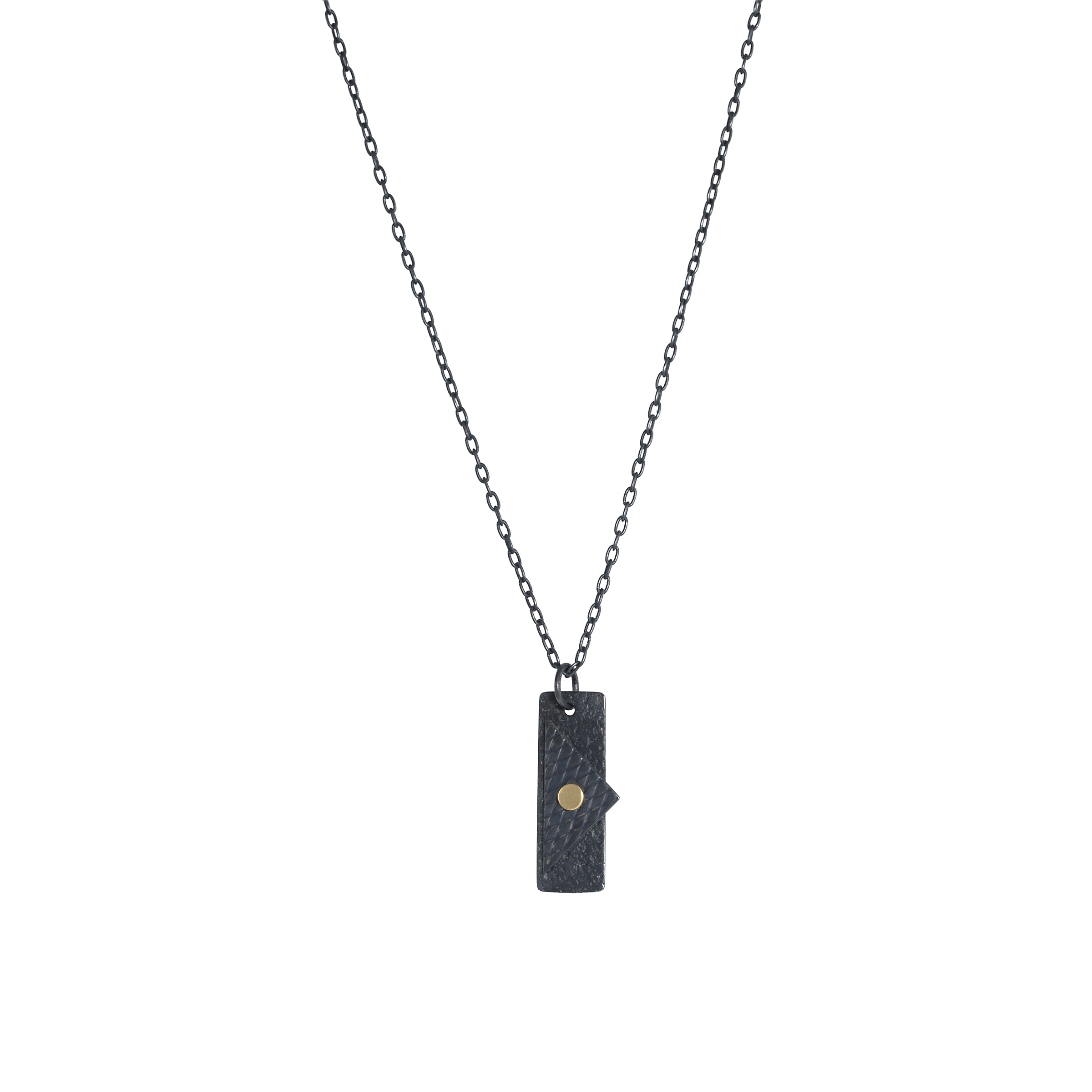 Oxidized argentium sterling silver and 18K gold charm pendant necklace with contemporary geometric styling in a layered look.