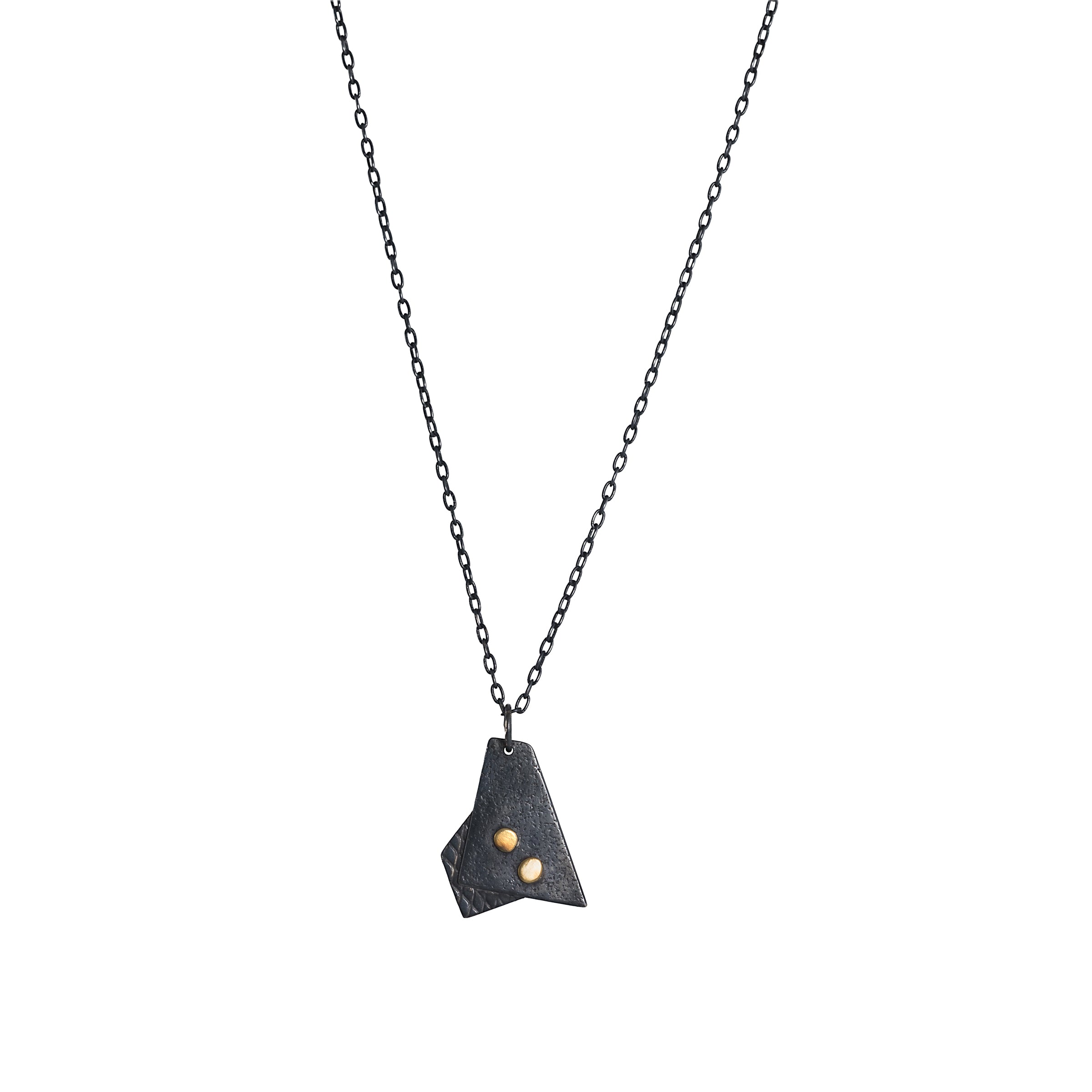 Oxidized argentium sterling silver and 18K gold charm pendant necklace with contemporary geometric styling in a layered look.