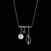 Sterling silver and 18K gold pendant necklace with London blue topaz (December birthstone) on sterling silver chain.