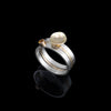 One-of-a-kind, three ring stacking set comprised of a sterling silver band with a 14k gold cup element, a 14k gold band, and a sterling silver band with an 8mm golden citrine set in 14k gold.  