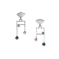 Contemporary post earrings, hand-fabricated in Argentium sterling silver and set with London Blue, Swiss Blue and white topaz.