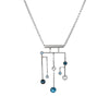 Contemporary pendant necklace, hand-fabricated in Argentium sterling silver and set with London Blue, Swiss Blue and white topaz.