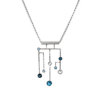 Contemporary pendant necklace, hand-fabricated in Argentium sterling silver and set with London Blue, Swiss Blue and white topaz.