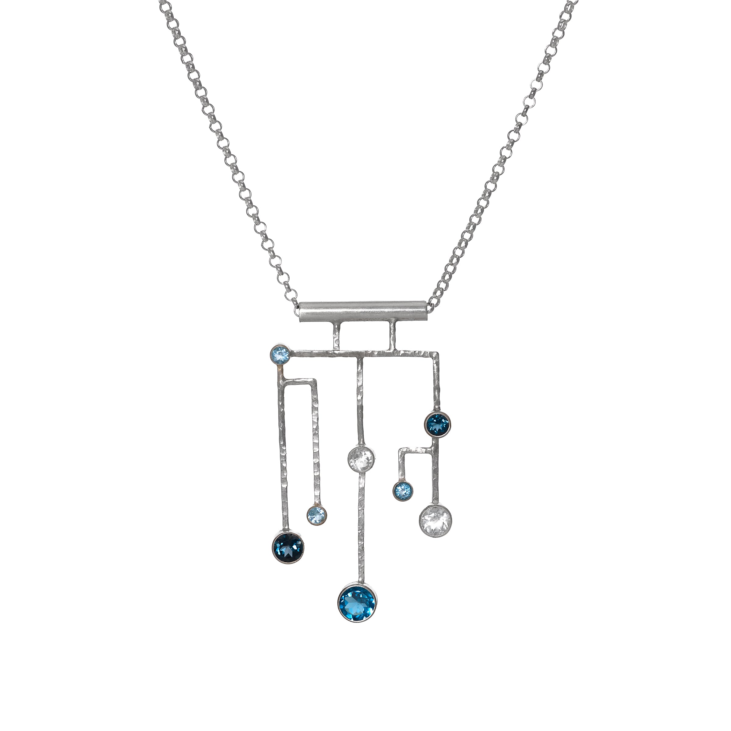 Contemporary pendant necklace, hand-fabricated in Argentium sterling silver and set with London Blue, Swiss Blue and white topaz.