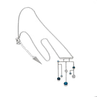 Contemporary pendant necklace, hand-fabricated in Argentium sterling silver and set with London Blue, Swiss Blue and white topaz.