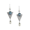 One-of-a-kind, dangle earrings in sterling silver featuring 10mm blue Mabe pearls, 4mm white topaz and 6mm white freshwater pearl drops.