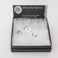 Asymmetrical, dangle earrings handcrafted in Argentium sterling silver with a sterling silver post back.