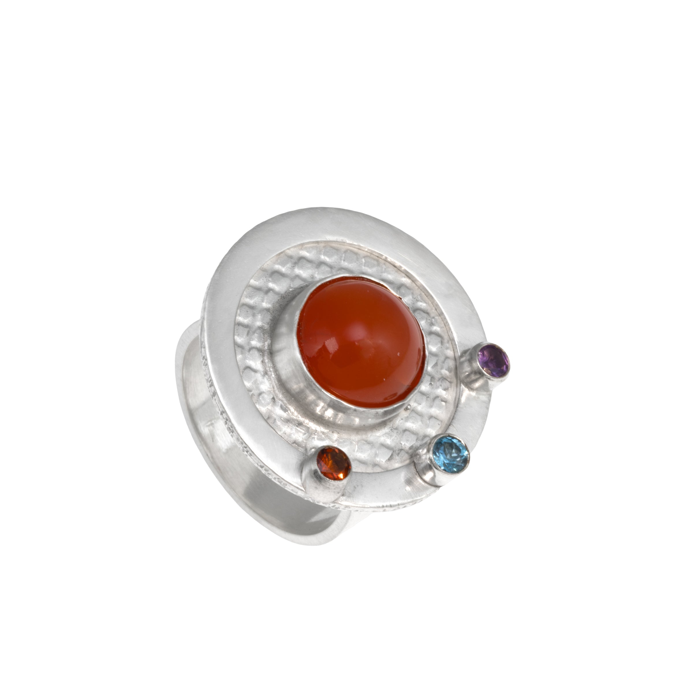 One-of-a-kind, statement ring in sterling silver with a 10mm orange chalcedony cabochon surrounded by three faceted stones – a fire citrine, London blue topaz and purple amethyst.  Size 8.