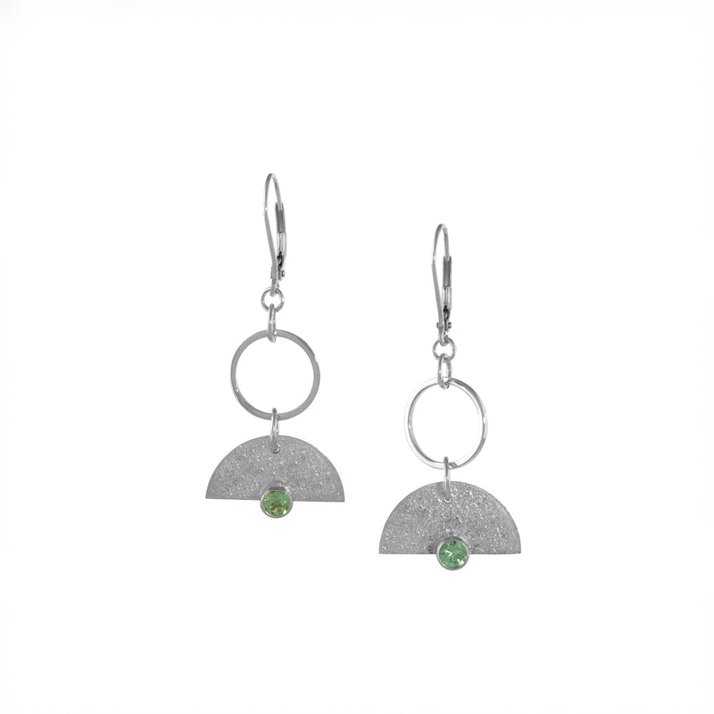 Crescent-shaped earrings handcrafted with Argentium and sterling silver and set with mint green tourmalines.