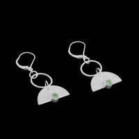 Crescent-shaped earrings handcrafted with Argentium and sterling silver and set with mint green tourmalines.