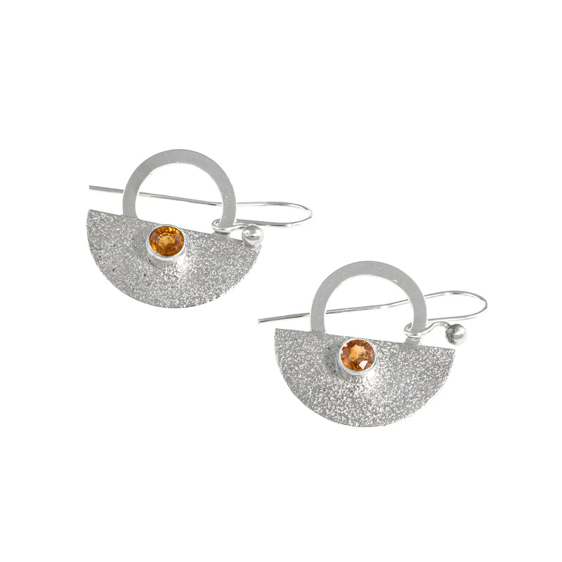 Crescent-shaped earrings handcrafted with Argentium sterling silver and set with Oregon fire opal stones. 