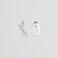 Asymmetrical, “exes and ohs” post earrings, handcrafted from textured Argentium silver with a sterling silver post back.