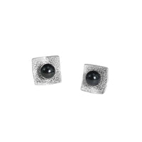 Hand-fabricated, post earrings in sterling silver with 6mm black pearls.