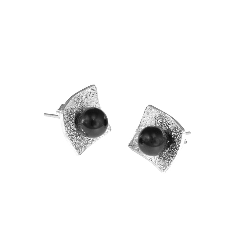 Hand-fabricated, post earrings in sterling silver with 6mm black pearls.