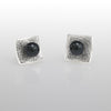Hand-fabricated, post earrings in sterling silver with 6mm black pearls.
