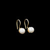 Elegant, handcrafted 14K gold and pearl earrings.