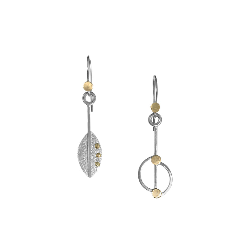 Asymmetrical, leaf-themed dangle earrings, hand-fabricated in sterling silver with 14k gold elements.