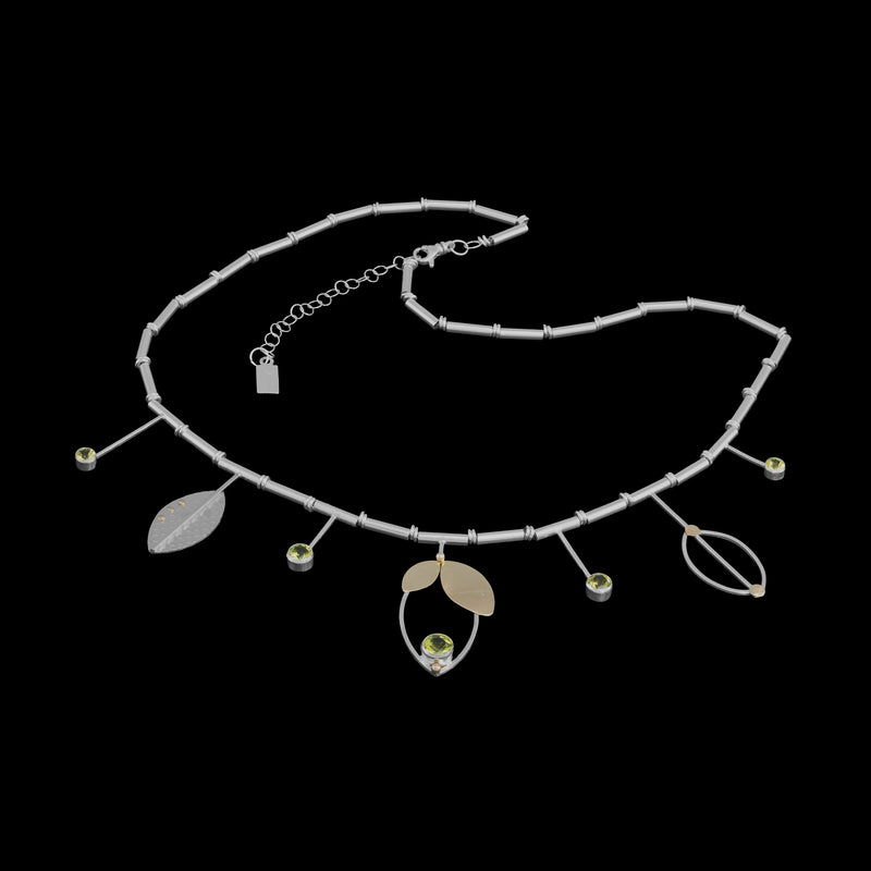Modern statement necklace, hand-fabricated in sterling silver and featuring five green peridots set with 14k gold leaves and elements.  18” with 2” extender.