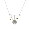 Modern geometric design pendant necklace, handcrafted from Argentium and sterling silver with 18K gold highlights and a London blue topaz set in an 18K gold bezel.