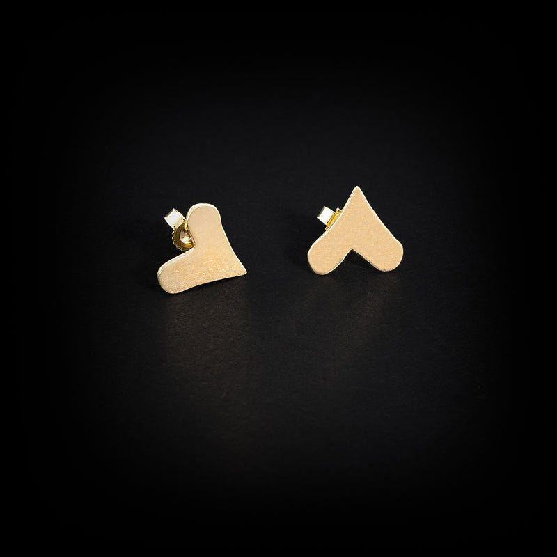 Hand-fabricated14K yellow gold post earrings with 14K gold posts and backs.