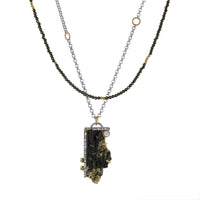 Delicate chain necklace composed of pyrite, 14K gold and sterling silver beads.  Shown with pyrite pendant necklace.