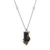 One-of-a-kind pendant necklace, hand fabricated from a large pyrite slab set in sterling silver and accented by a white sapphire and 14K gold elements.  Sterling silver rolo chain.  