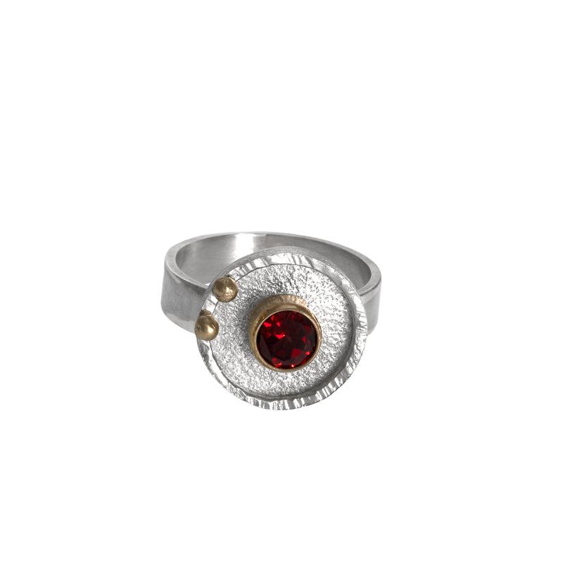 Statement ring hand-fabricated in sterling silver and set with a 6mm red garnet and 14k gold balls.