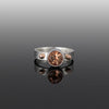 Sterling silver ring featuring an 8mm Oregon sunstone highlighted by 14k gold elements.
