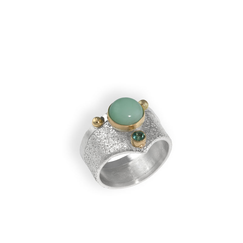 One-of-a-kind ring set, hand fabricated from sterling silver.  Large ring features a green chrysoprase and a mint green tourmaline both set in 14K gold.  Small ring features two 14K gold balls.