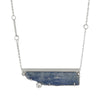 Contemporary, one-of-a-kind pendant necklace, handcrafted from a blade of blue Kyanite, framed in sterling silver and accented by three white topaz stones.  Sterling silver rolo chain.