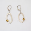 Modern, asymmetrical dangle earrings, handcrafted in Argentium sterling silver with 18K gold accents.