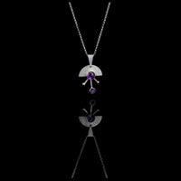 Contemporary sterling silver pendant necklace featuring a 8mm and 5mm purple amethysts set in 14k gold with additional 14K gold elements.  18” chain with 2” extender. 