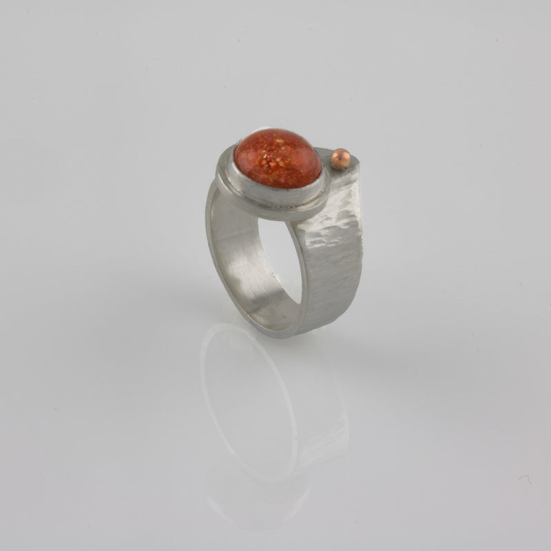 Unique statement ring, handcrafted from Argentium sterling silver and highlighted by a 10mm Oregon sunstone and a rose gold ball.