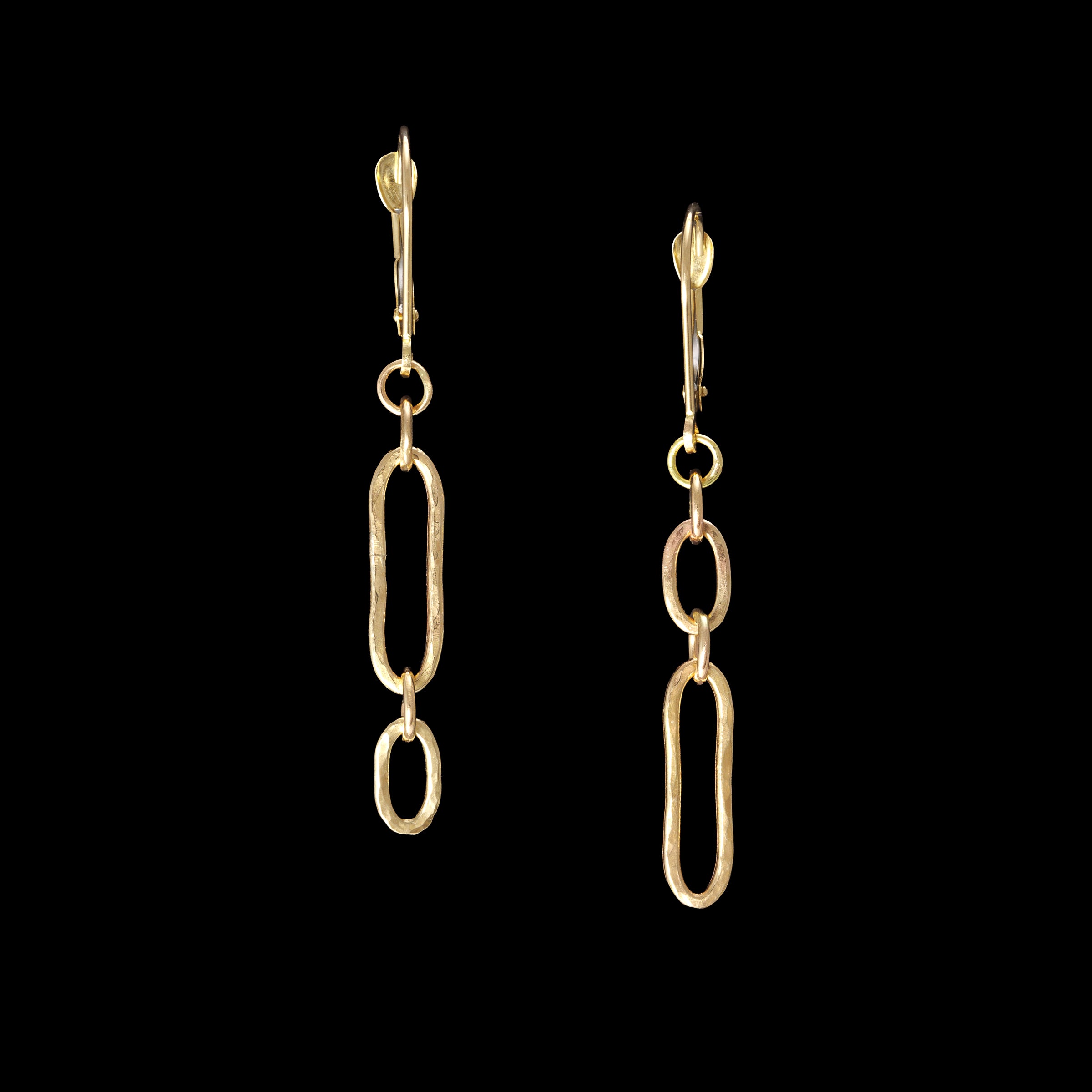 Hand-crafted dangle earrings in 14K gold with secure lever back wires.