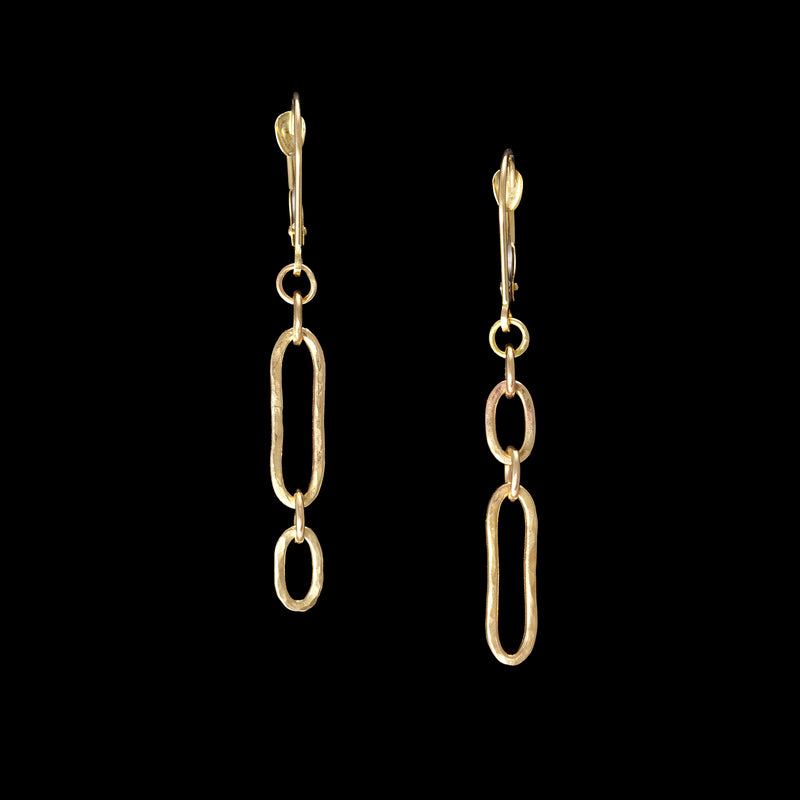 Hand-crafted dangle earrings in 14K gold with secure lever back wires.