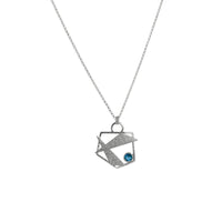 Contemporary design pendant necklace, handcrafted from Argentium sterling silver and set with a 6mm London blue topaz.  Sterling silver chain.