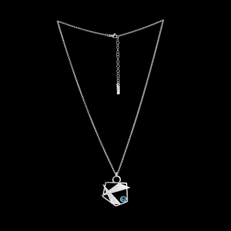 Contemporary design pendant necklace, handcrafted from Argentium sterling silver and set with a 6mm London blue topaz.  Sterling silver chain.