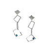 Contemporary trapezoid dangle earrings, handcrafted from Argentium and sterling silver and set with London blue topaz stones. 