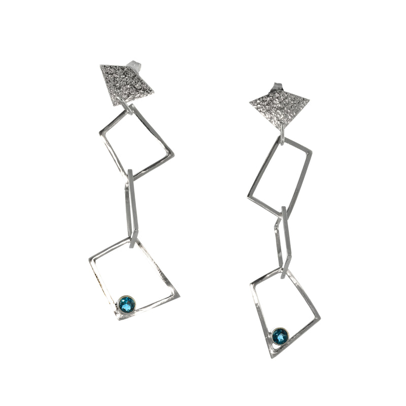 Contemporary trapezoid dangle earrings, handcrafted from Argentium and sterling silver and set with London blue topaz stones. 