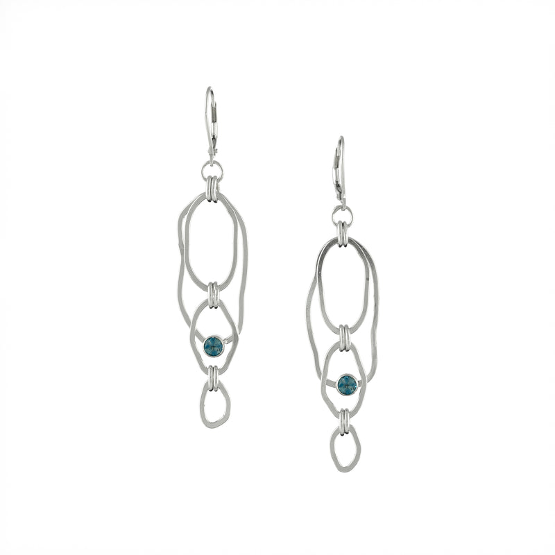 Contemporary dangle earrings, handcrafted from rings of Argentium sterling silver set with 4mm London blue topaz stones.  Lever back ear wires.